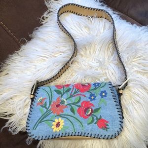 Embroidered denim bag.